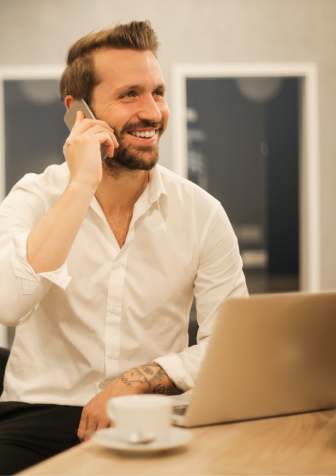 A man sitted and calling someone - conzummate tech